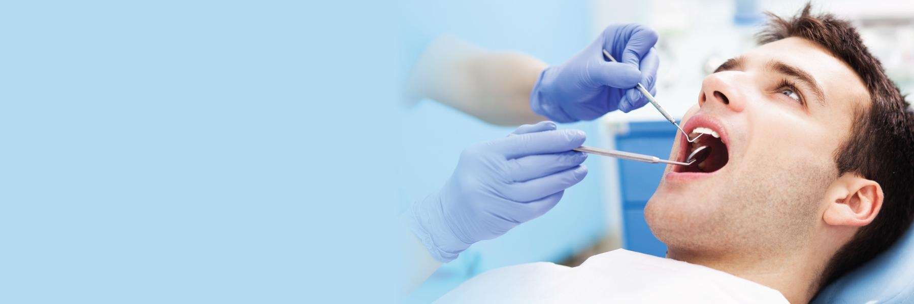 Patient undergoing teeth cleaning in Aston, PA