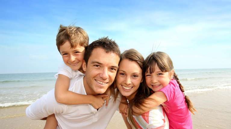A happy family after visiting The Dental Health Center