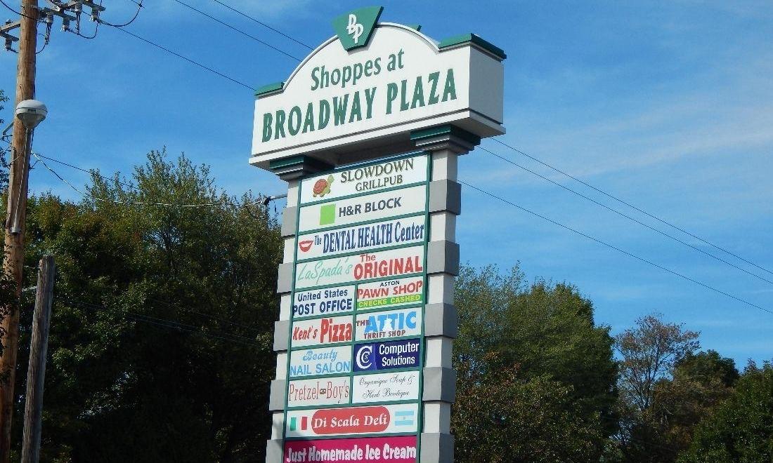 Sign for The Dental Health Center at Broadway Plaza in Aston PA